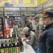 Satpol PP Kota Depok saat menyita miras berbeagai merek dari pedagang jamu tradisional di kawasan Sawangan, Depok. (Dokumen Satpol PP)