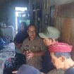 Caption : Camat Bojongsari, Rizal Farhan saat memberikan bantuan melalui program GPS kepada masyarakat yang membutuhkan. (Rahmat CH)
