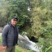 Camat Bojongsari, Rijal Farhan saat melihat langsung Curug Wadon yang memiliki potensi wisata lokal di Kelurahan Curug, Bojongsari, Depok. (Rahcmat CH)